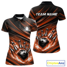 Load image into Gallery viewer, Front and back view of a black and orange women’s bowling polo shirt showcasing a fiery bowling ball striking pins with abstract stripe graphics.