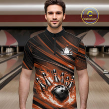 Load image into Gallery viewer, Male model wearing a black and orange bowling quarter-zip shirt at a bowling lane with fiery bowling action artwork and dynamic stripe accents.