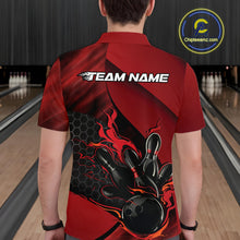 Load image into Gallery viewer, Close-up of the left chest area on a black and red bowling polo shirt featuring a flaming bowling strike design with hexagon details.