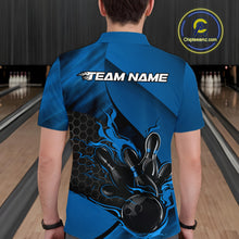 Load image into Gallery viewer, Back view of a male model in a bowling alley wearing a black and blue polo shirt showcasing a flaming bowling ball knocking down pins.