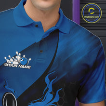 Load image into Gallery viewer, Close-up left chest view of a black and blue bowling polo shirt featuring a flaming bowling ball striking pins over a hexagon pattern.