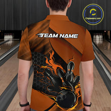 Load image into Gallery viewer, Back view of a male model in a bowling center wearing a black and orange polo shirt featuring a flaming bowling strike scene.