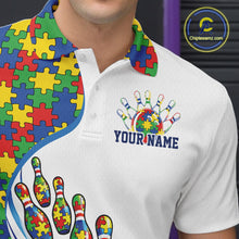 Load image into Gallery viewer, Close-up left chest detail of white bowling polo shirt featuring colorful autism bowling strike emblem and puzzle-inspired design