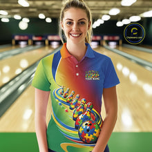 Load image into Gallery viewer, Female model in a bowling lane, front view wearing a colorful polo shirt with autism puzzle bowling ball and aligned pins illustration