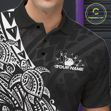Load image into Gallery viewer, Close-up of the left chest on a black and white bowling polo shirt displaying Polynesian-inspired bowling motifs.