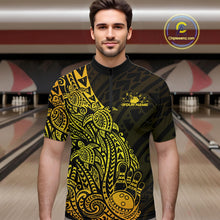 Load image into Gallery viewer, Male model wearing a black and gold bowling quarter-zip shirt at the lane with tribal bowling graphics and turtle motifs.