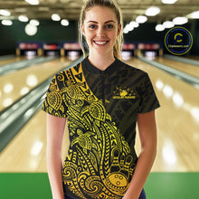 Load image into Gallery viewer, Female model wearing a black and gold bowling quarter-zip shirt at the bowling lane with turtle Polynesian bowling graphics.