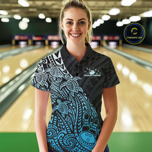 Load image into Gallery viewer, Female model wearing a black and blue bowling polo shirt at the lane with Polynesian-inspired bowling motifs.