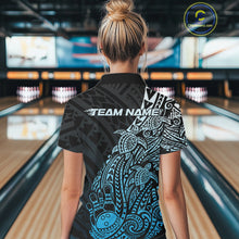 Load image into Gallery viewer, Back view of a female model in a black and blue bowling polo shirt featuring tribal bowling artwork and turtle accents.