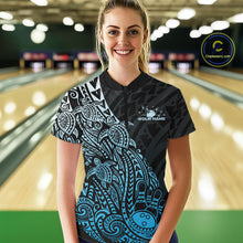 Load image into Gallery viewer, Female model wearing a black and blue bowling quarter-zip shirt at the lane with tribal-inspired bowling graphics.