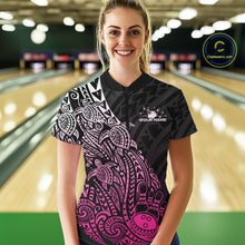 Load image into Gallery viewer, Female model wearing a black and pink bowling quarter-zip shirt at the bowling lane with Polynesian-style bowling artwork.