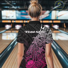 Load image into Gallery viewer, Back view of a female model in a black and pink bowling quarter-zip shirt featuring tribal swirl accents and bowling motifs.