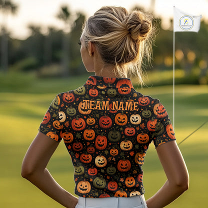 A woman viewed from behind on a golf course, wearing a short-sleeve collared polo shirt with an all-over Halloween pumpkin print and 'TEAM NAME' printed across the back.
