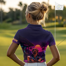 Load image into Gallery viewer, Woman wearing a purple golf shirt with a dog graphic on a golf course