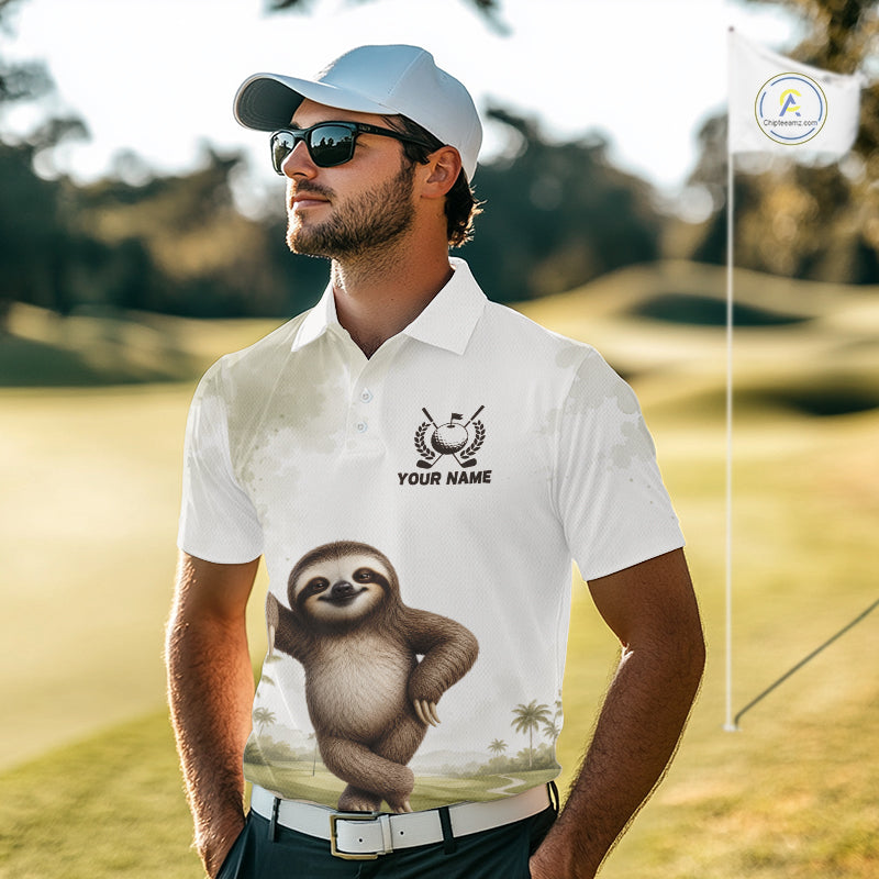 Man wearing a white polo shirt with a sloth graphic on a golf course
