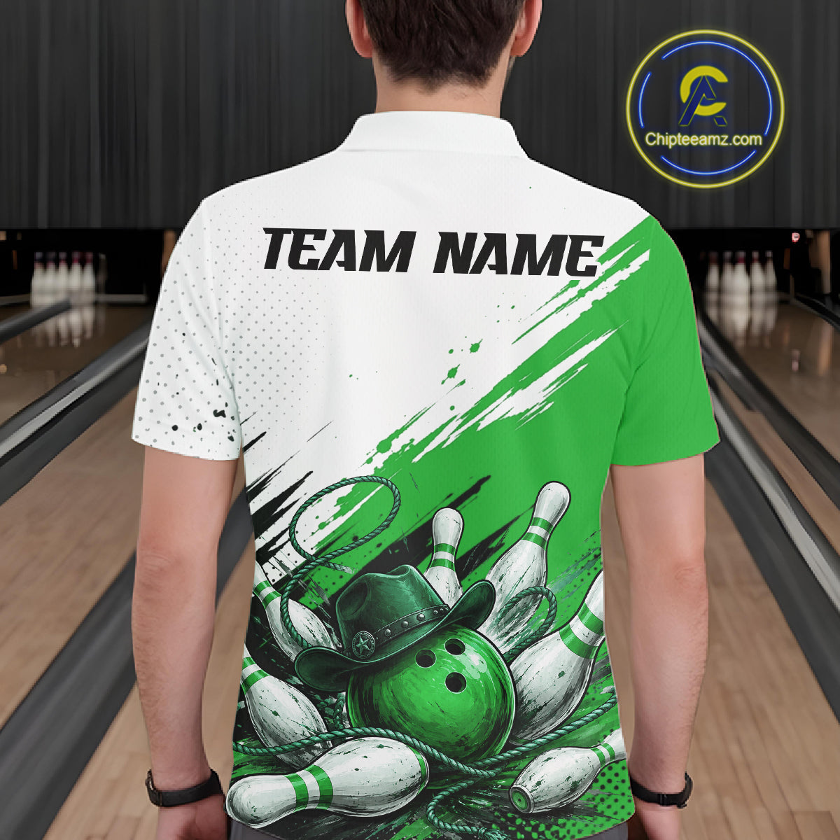 A man viewed from behind wearing a custom bowling-themed short-sleeve polo shirt. The shirt features a white upper back with black 'TEAM NAME' text, a green right shoulder, and a large graphic of bowling balls, pins, and a hat on the lower back.