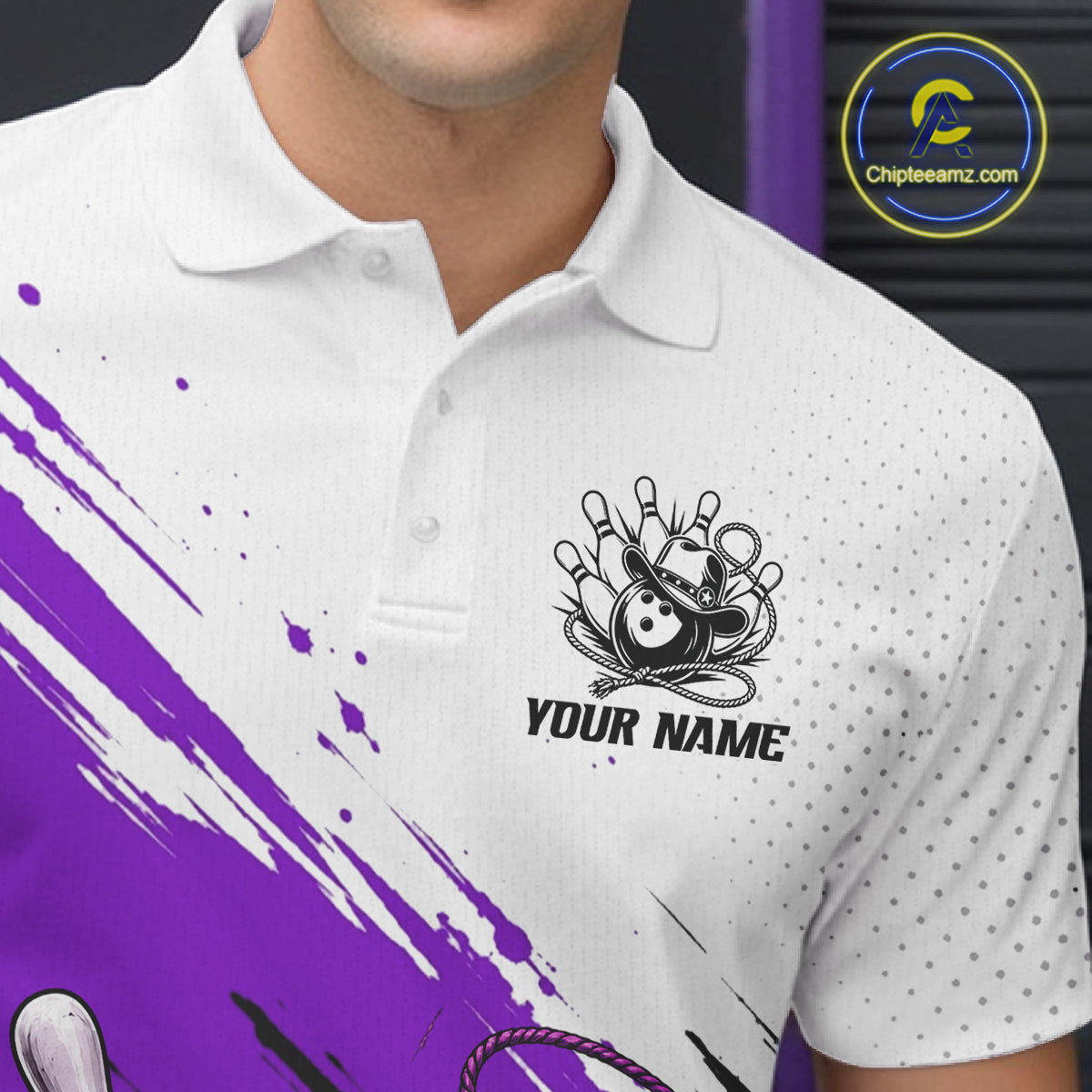White polo shirt with a black bowling-themed chest graphic and the text 'YOUR NAME', shown on a cropped male model. Purple paint-splatter graphics appear across the lower left