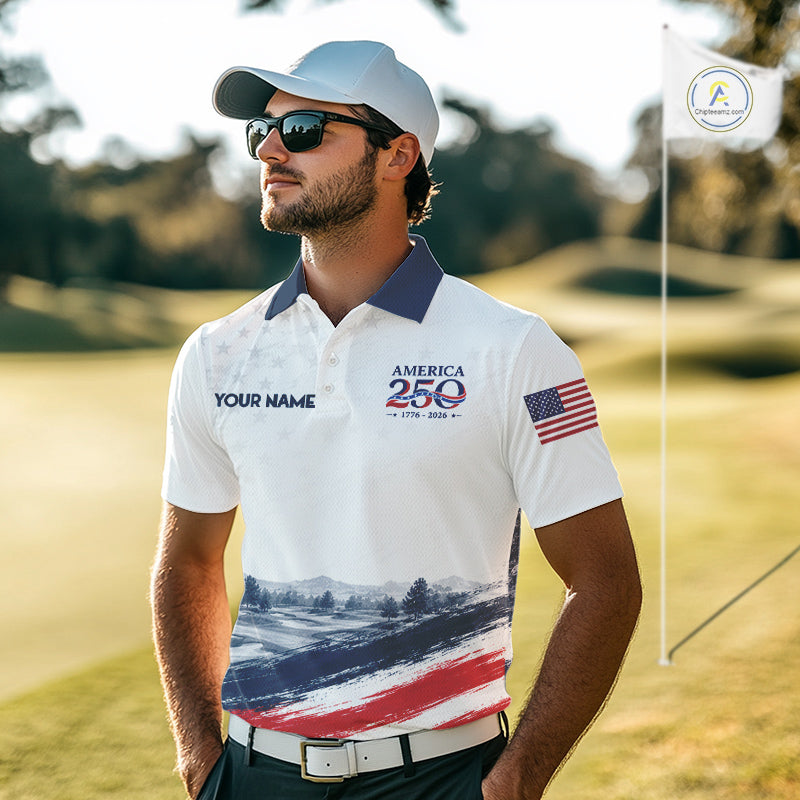 Man wearing a white polo shirt with American-themed design on a golf course