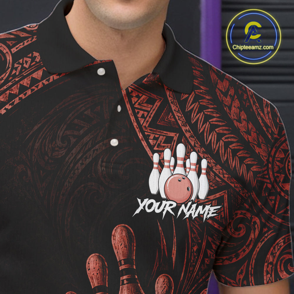 A close-up of a man wearing a black short-sleeve polo shirt with a red tribal pattern and a bowling-themed graphic on the chest featuring bowling pins, a bowling ball, and the text 'YOUR NAME'.