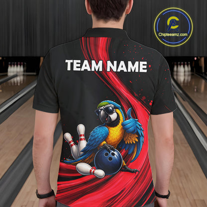 A person viewed from behind wearing a black short-sleeve bowling-themed shirt with a large graphic of a blue and yellow parrot holding a bowling ball, white bowling pins, and red streaks. The back has the text 'TEAM NAME' in white.