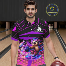 Load image into Gallery viewer, Man wearing a colorful bowling shirt with a sloth design in a bowling alley.