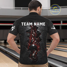 Load image into Gallery viewer, Man wearing a black bowling shirt with 'TEAM NAME' on the back in a bowling alley.