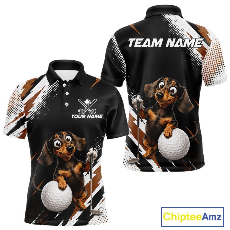 Front and back views of a custom black short-sleeve polo shirt with a dachshund golf graphic, white and brown halftone patterns, and customizable text placeholders 'TEAM NAME' and 'YOUR NAME'.
