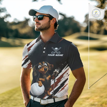 A man wearing a custom printed short-sleeve polo shirt on a golf course. The shirt features a black base with white and brown brushstroke patterns, a cartoon dachshund holding a golf club and golf ball, and the text 'YOUR NAME' and crossed golf clubs.