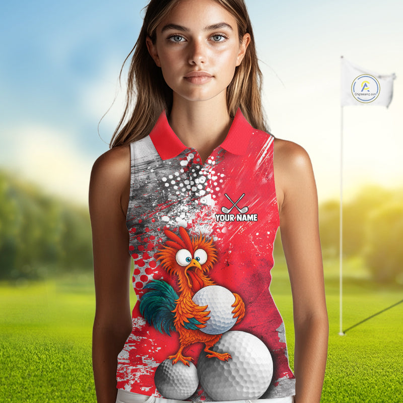 A woman modeling a sleeveless collared golf shirt with a vibrant red, white, and gray graphic print featuring a cartoon rooster and golf balls, set against a blurred golf course background with a flag.