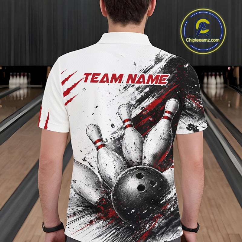 A man viewed from behind wearing a white short-sleeve bowling-themed polo shirt with a large black, white, and red graphic of bowling pins and a bowling ball, plus 'TEAM NAME' text across the upper back. The background shows a blurred bowling alley interior, and a circular 'Chipteeamz.