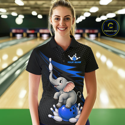 A woman wearing a custom bowling-themed polo shirt with a cartoon elephant and blue bowling ball graphic, standing in a bowling alley. The shirt features a black base with blue accents and a customizable text placeholder.