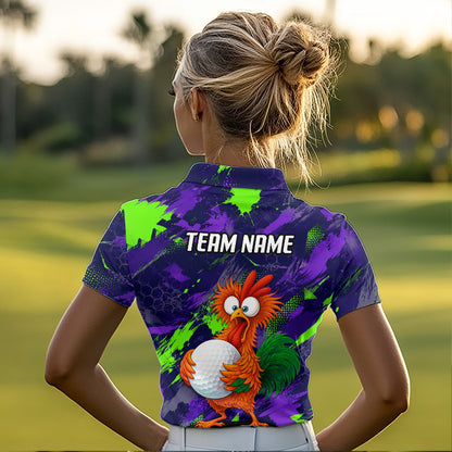 A woman on a golf course seen from behind, wearing a short-sleeve collared polo shirt with a colorful graphic print. The shirt features a purple and green abstract background, the text 'TEAM NAME' in white, and a cartoon bird holding a golf ball.