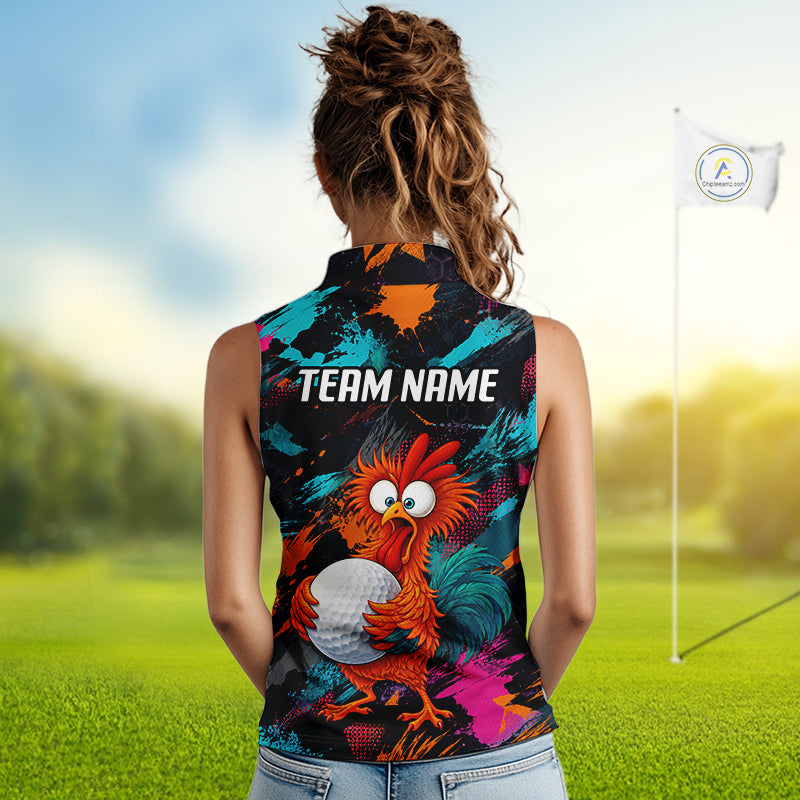 A woman viewed from behind wearing a sleeveless high-neck athletic top with a colorful tropical-style graphic featuring a cartoon rooster, paint splatters, and the text 'TEAM NAME' on the back. The background is a blurred golf course with green grass, trees, and a flag.