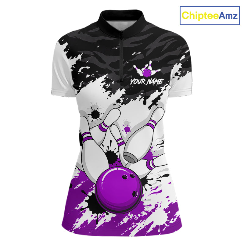 A short-sleeve polo-style bowling shirt with a black, white, and purple all-over graphic print featuring bowling pins and a bowling ball. The shirt has a black collar, a short front zipper, and 'YOUR NAME' printed on the chest as a customizable placeholder.
