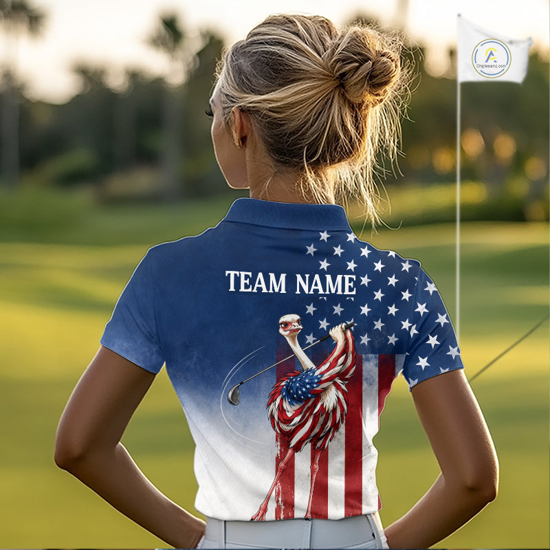 Person wearing a golf shirt with an American flag design on a golf course