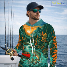 Load image into Gallery viewer, Man wearing a colorful hoodie with nature design by the sea