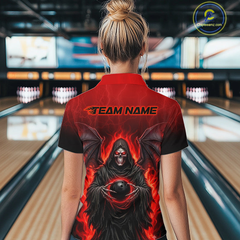 A woman viewed from behind at a bowling alley wearing a red and black short-sleeve collared shirt with a large grim reaper graphic and the words 'TEAM NAME' printed across the back.