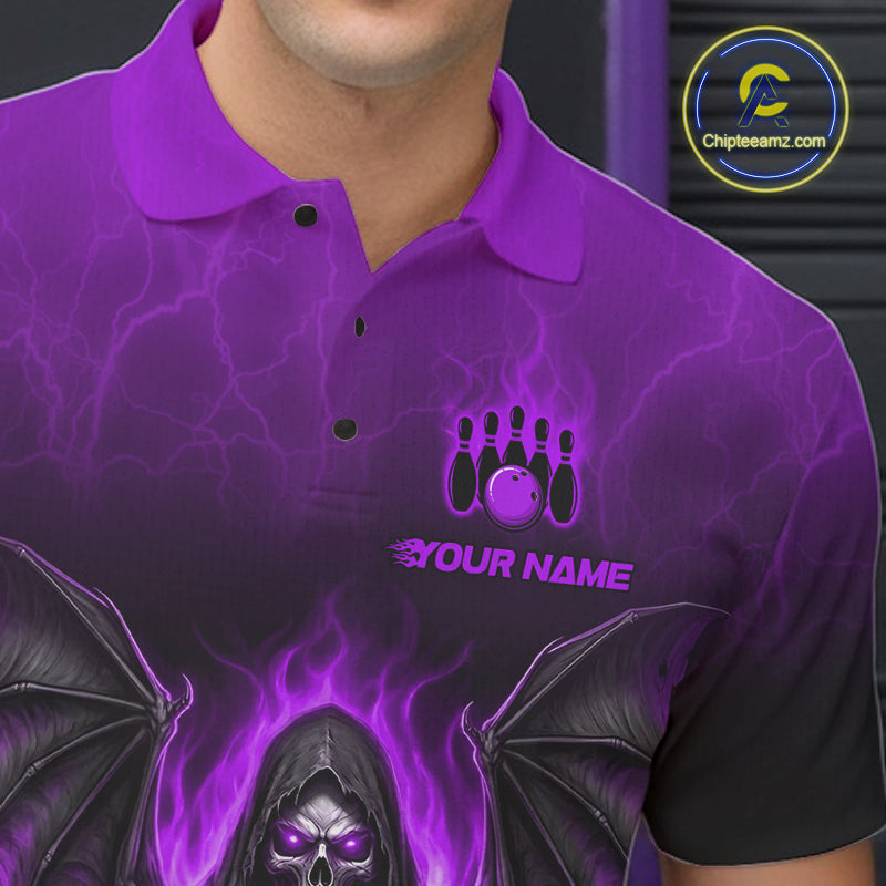 A close-up of a person wearing a purple short-sleeve polo shirt with a black and purple graphic design featuring lightning, bowling pins, a bowling ball, the text 'YOUR NAME', and a grim reaper with wings and flames
