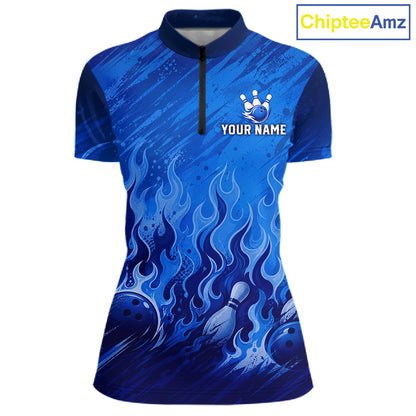 A women's short-sleeve quarter-zip polo shirt with a blue bowling-themed graphic print featuring flames, bowling pins, and balls. The shirt has a mock neck, a black zipper, and a customizable chest area with a bowling pin graphic and the text 'YOUR NAME'.