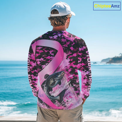 Angler wearing pink ribbon camouflage catfish fishing breast cancer long sleeve sun protection shirt on the water - back view