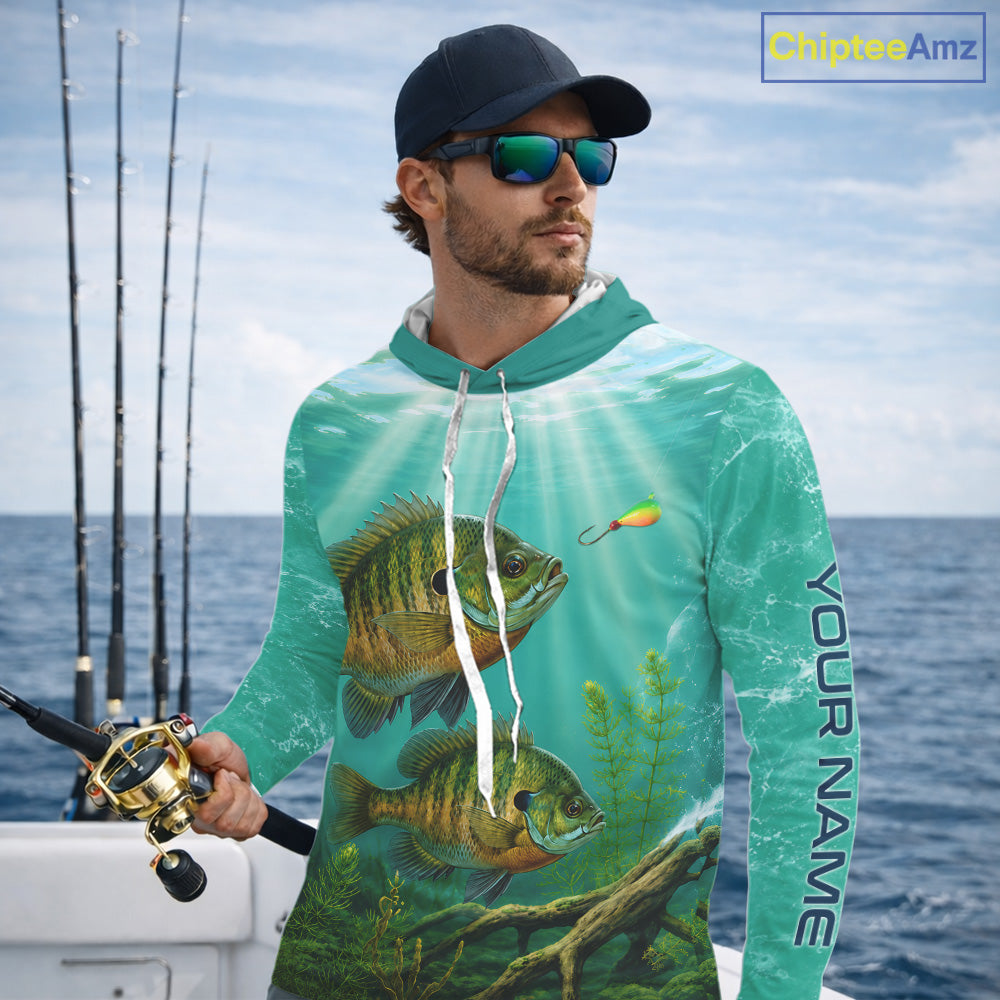 Angler wearing Custom Bluegill Fishing Jersey long sleeve hooded tournament fishing shirt with personalized name on the sleeve.