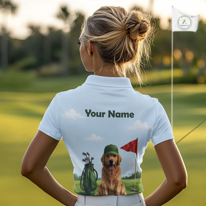 Person wearing a golf themed shirt with a dog and golf club design on a golf course.