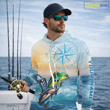 Load image into Gallery viewer, Angler wearing mahi mahi wahoo tuna blue hooded performance fishing shirt on boat with custom name on sleeves