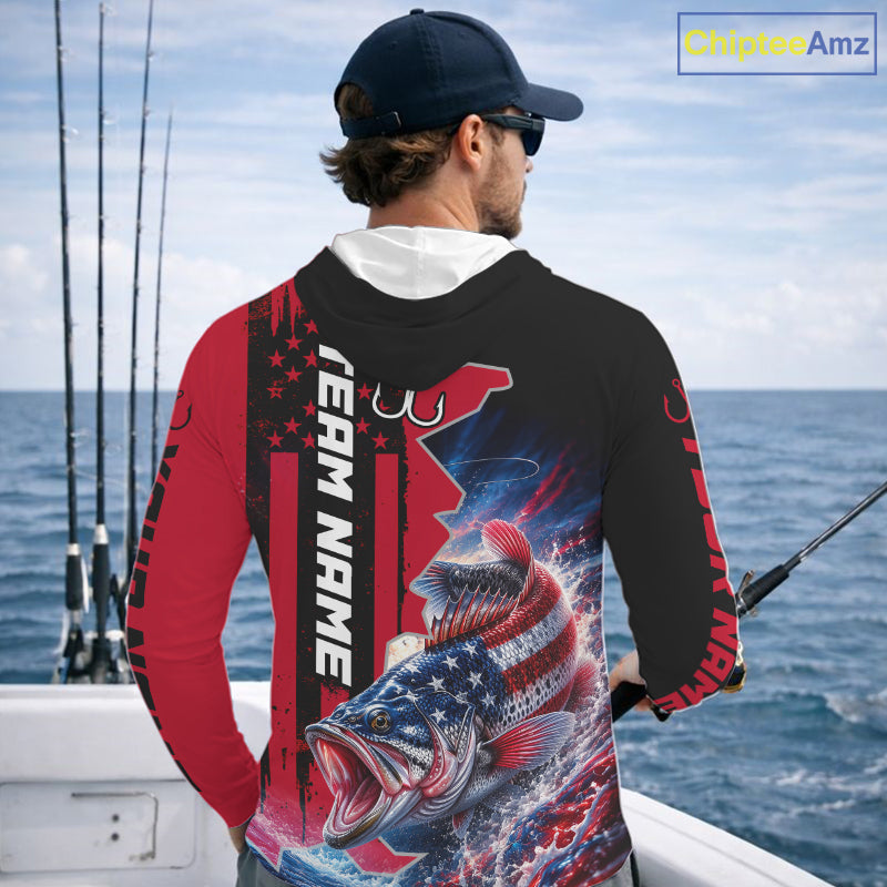 Angler wearing custom American flag bass patriotic red camo long sleeve hooded fishing shirt on the water