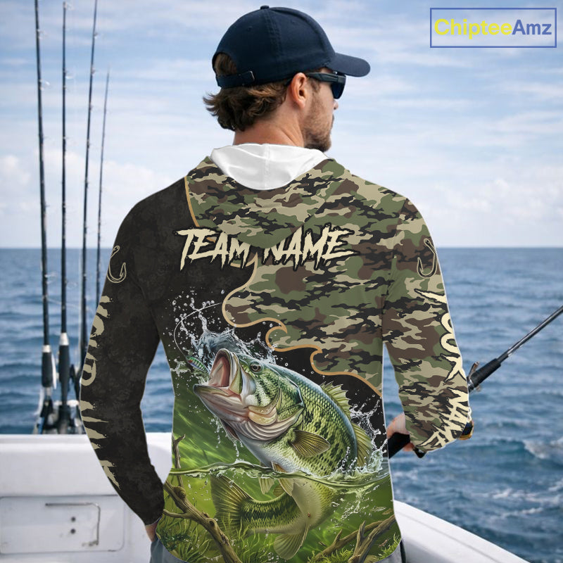 Angler wearing personalized green camouflage largemouth bass long sleeve hooded fishing shirt on the water - back view