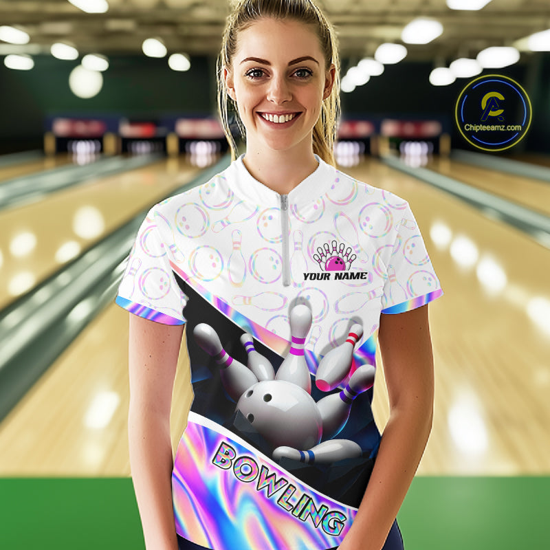 Woman bowler wearing custom neon cosmic bowling team 1/4 quarter zip shirt on the lanes