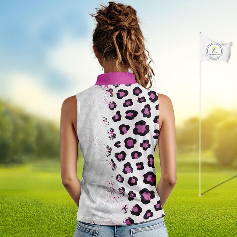 Woman wearing a sleeveless shirt with a leopard print pattern on a golf course.