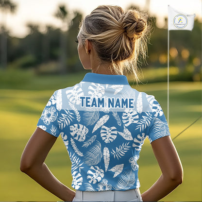 Person wearing a blue and white patterned golf polo shirt with 'TEAM NAME' on a golf course