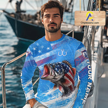 Load image into Gallery viewer, Man wearing a blue patriotic bass fishing shirt with custom name, standing on a boat