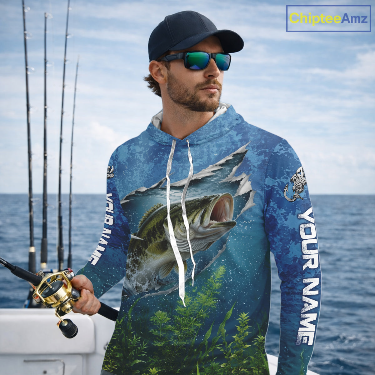 Angler wearing Personalized Bass Fishing Jersey custom camo long sleeve hooded bass fishing shirt, breathable UPF 30+ long sleeve hooded fishing shirt on the boat